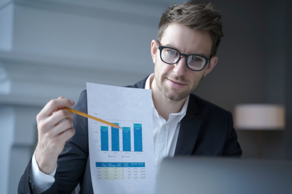 Focused professional analyzing data during a video call